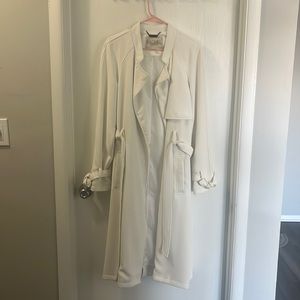 Beautiful white trench coat. Worn 1X